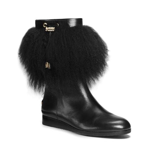 michael kors black fur boots|Michael Kors adjustable buckle boots.